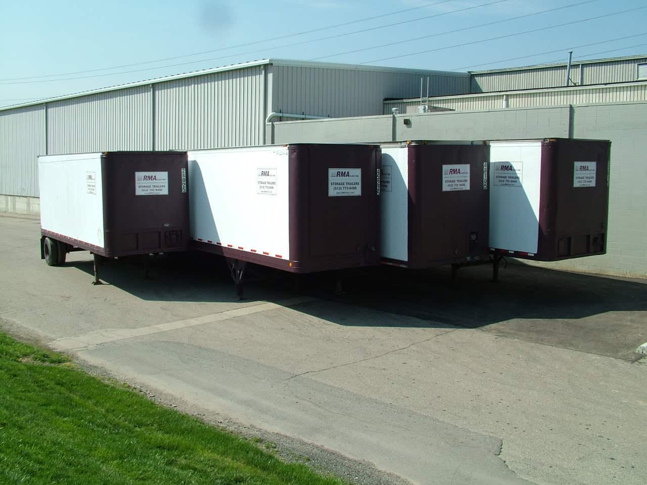 RMA Fleet storage trailers in multiple lengths lined up at a West Chester Ohio industrial building